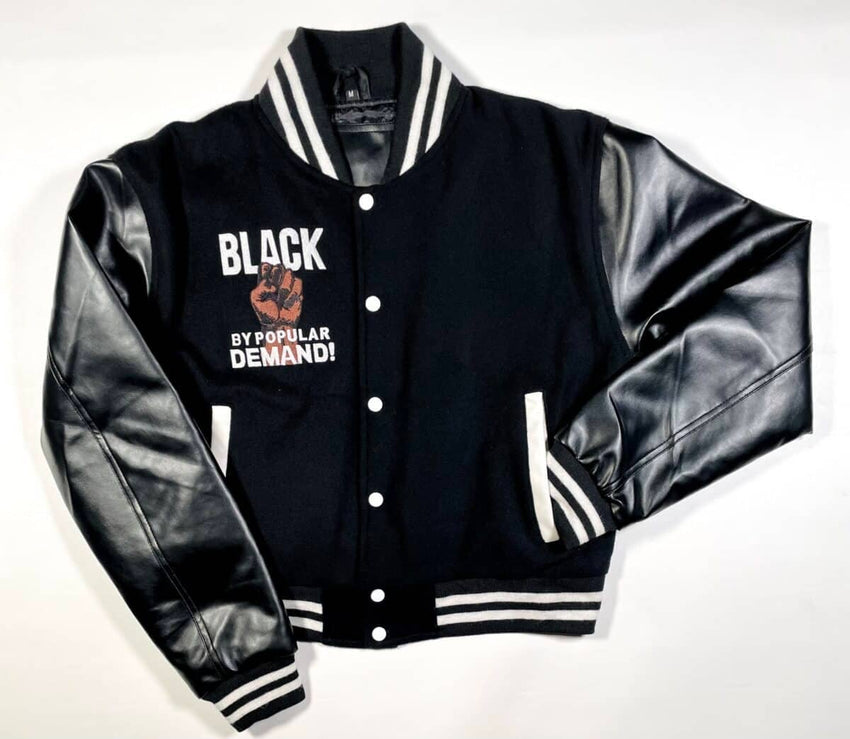 HGC Apparel LLC - Black by Popular Demand® Women’s Crop Black Varsity Jacket